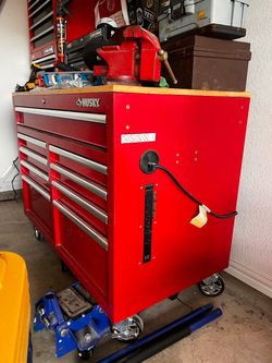 Husky 52” tool box with wood top.