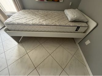 Twin bed with mattress