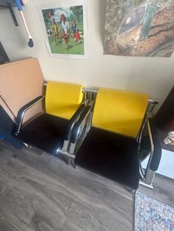 2 mid century modern style chairs