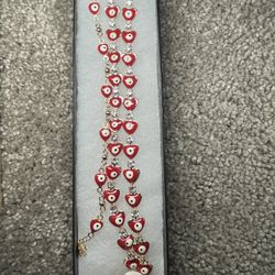 3 Red Eye Bracelets With 2 Matching Rings NEED GONE 