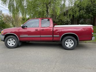 A.R.E. fiberglass tonneau cover fits Toyota Tundra access cab, 2000–2006