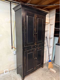 Black distressed wood look cabinet