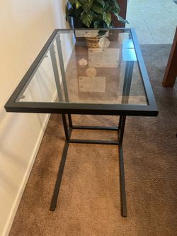 Simple glass stand for the side of bed.
