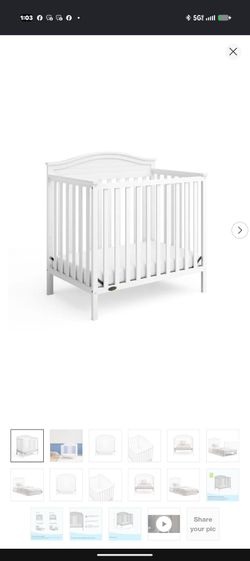 Like new white baby crib. Three-in-1