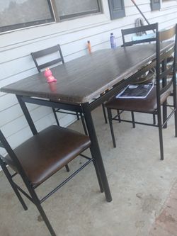Table Rectangular With 4 Chairs...$40 Dls All