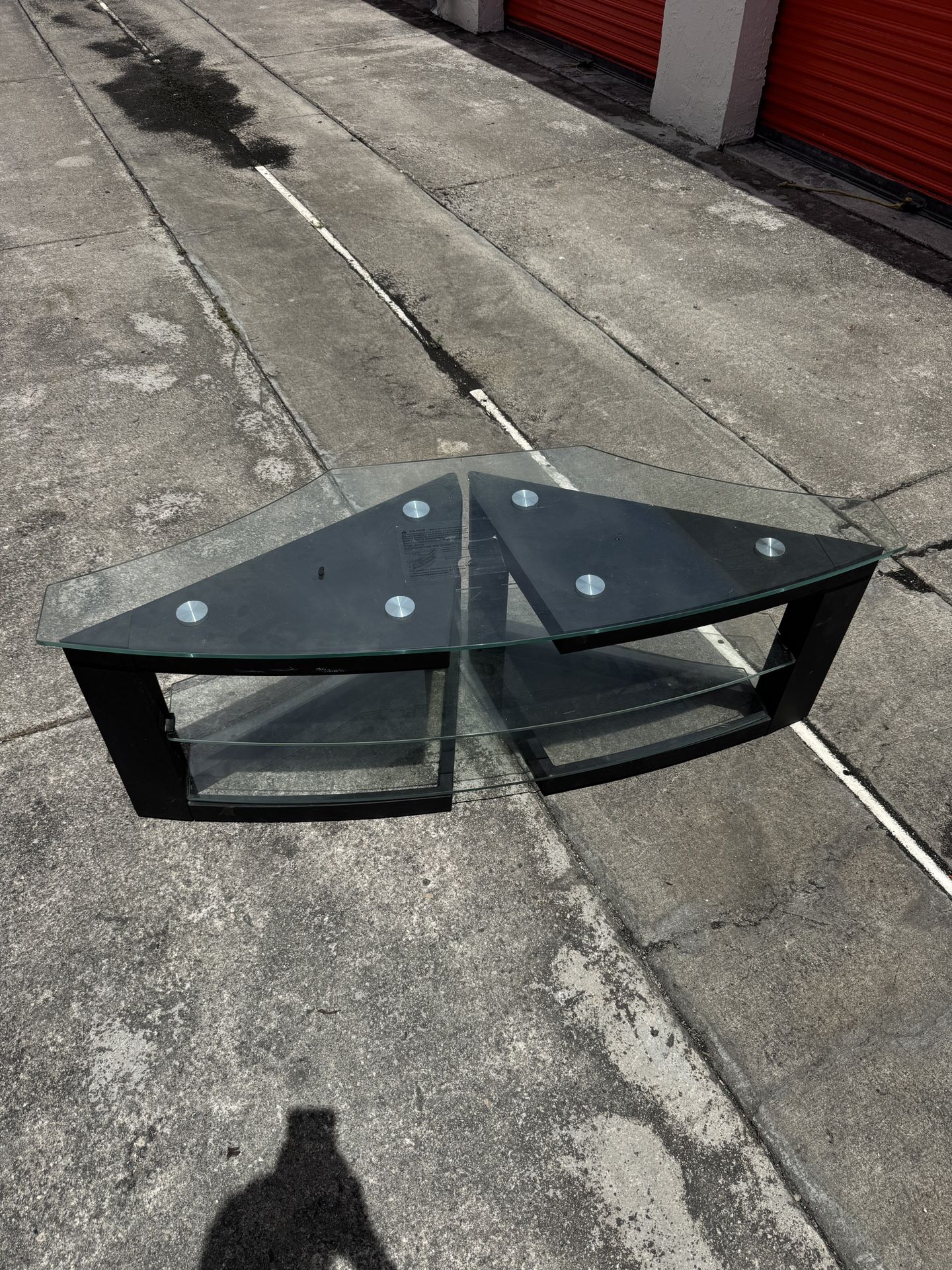 Glassa TV / Entertainment center with three Glass shelves. Good condition.