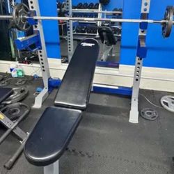 Squat Rack With Adjustable Bench And Spotter Arms