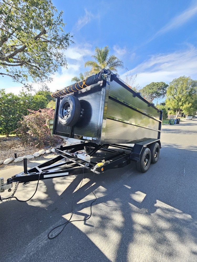 NEW DUMP TRAILER 8X12X4 12000 LBS
ROLLING TARP--SPARE TIRE,ELECTRIC BRAKES,HYDRAULIC SYSTEM,REMOTE CONTROL,IDEAL FOR HAULING, DEMOLITION, TRASH ETC,