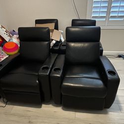 Four Black Recliners