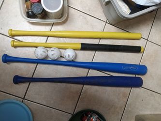 Whiffle ball bats & plastic baseball bats + 3 balls
