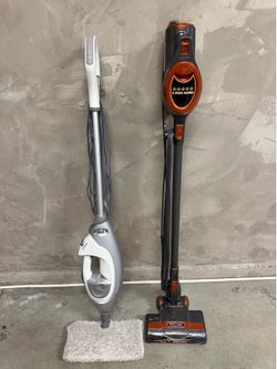 Vacuum and steam floor cleaner