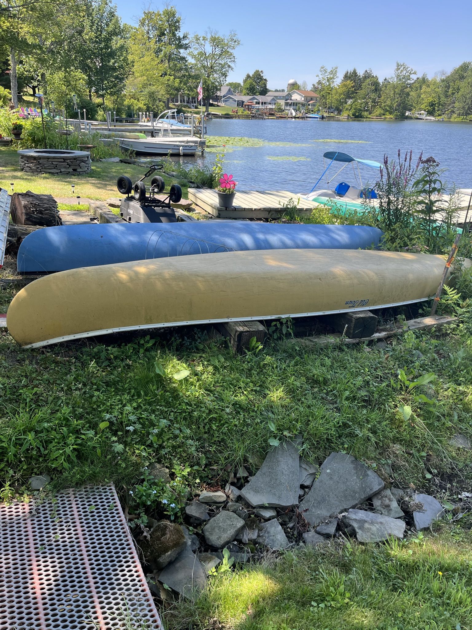 16 Ft. Old town Yellow Canoe With Paddles