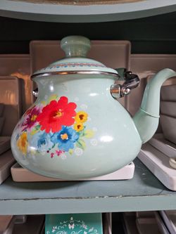 Pionner Woman Tea Kettle  new l used for decoration only