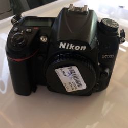 Nikon D7000 Camera Body With Battery, Charger, USB Cable, And Manual 