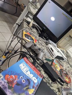 Ps2 console with 10 games 2 controllers power cord av tv audio video free delivery with full price