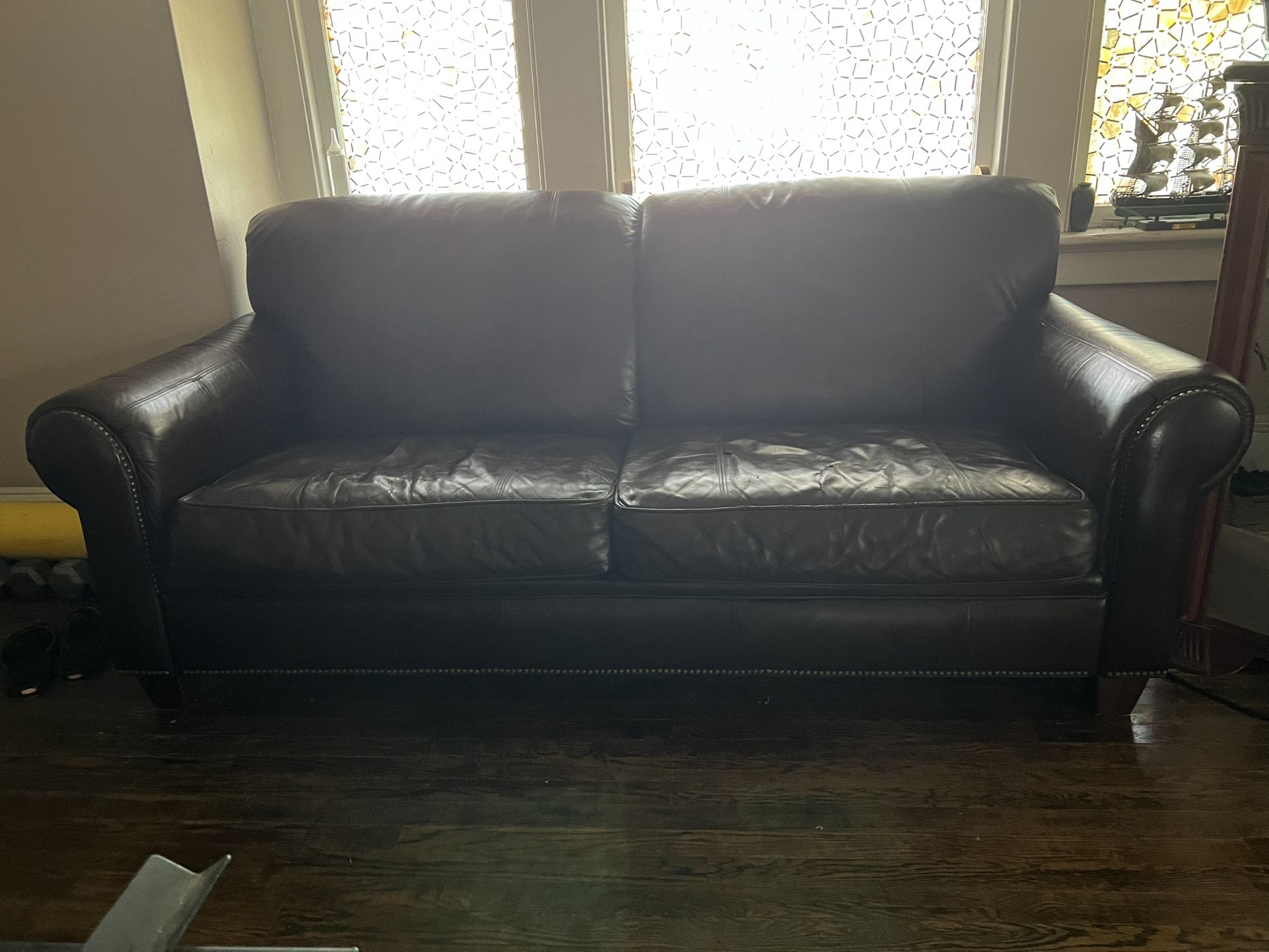 Full real leather couch about 6 feet normal wear pics shown