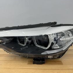 BMW 5 series drivers side left headlight 