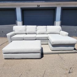 Grey Living Spaces Sectional Couch with Ottoman 