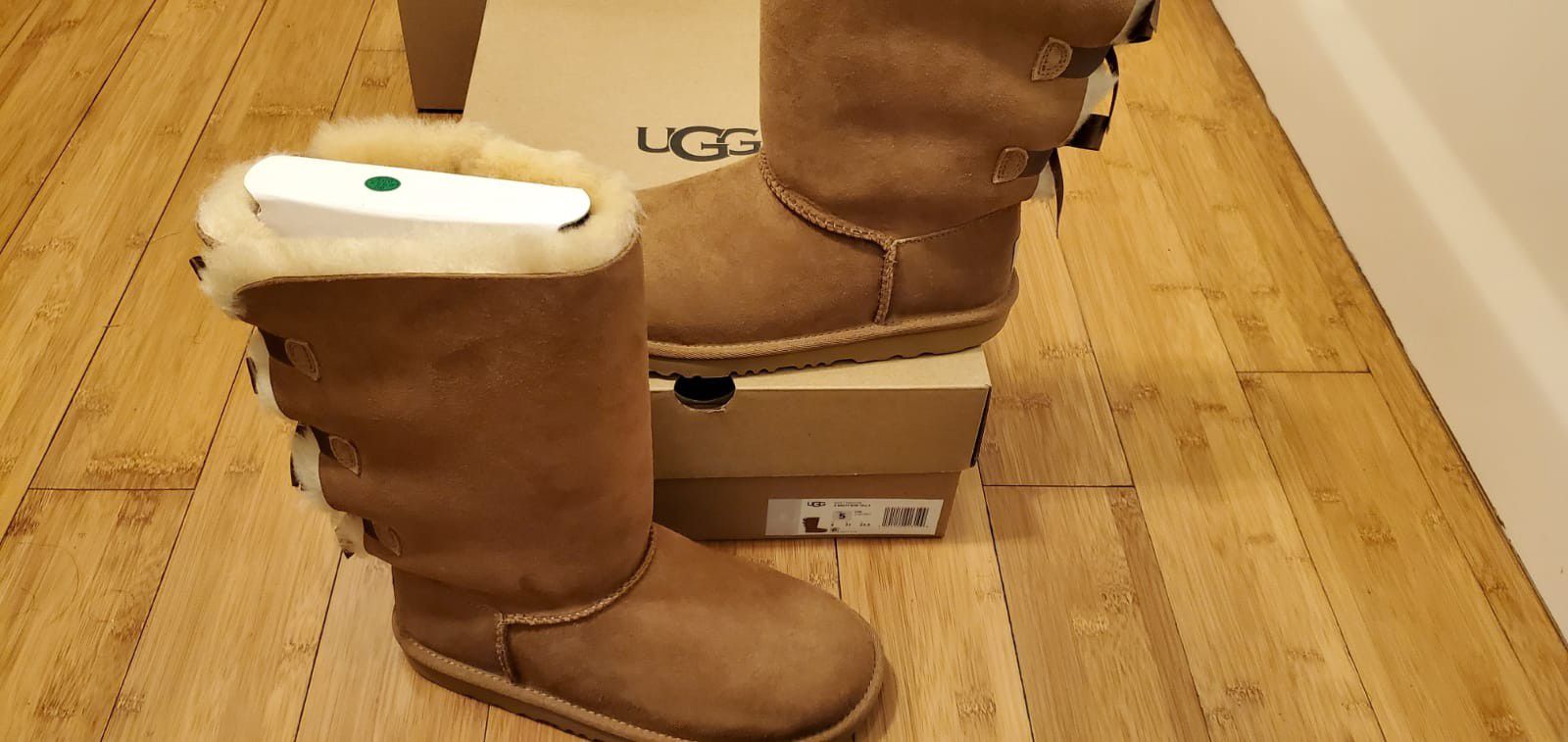 UGG Boots with 3 Bows in the Back size 7 and 8 for Women .