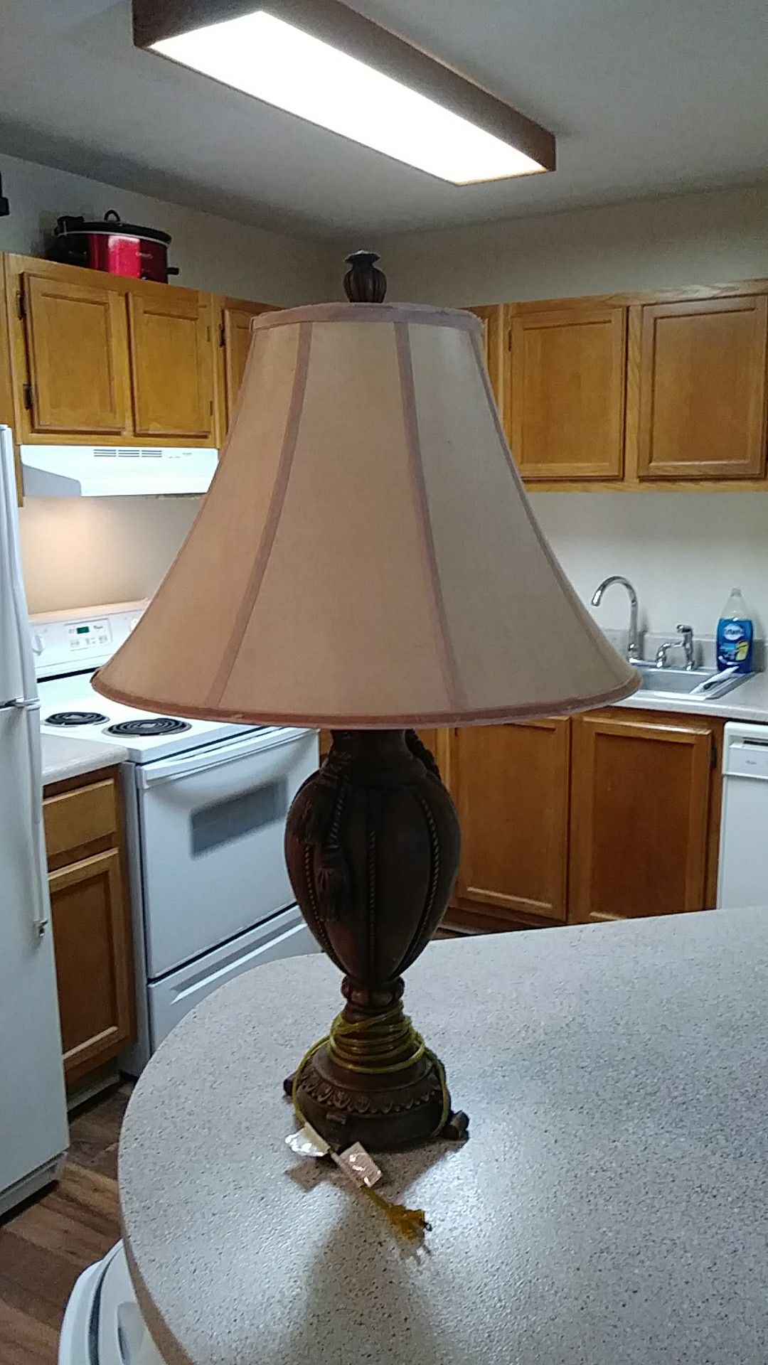 Really nice lamp.. Brownish and a tan lamp shade. Dont have enough room