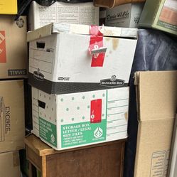 Two plastic sheds full of stuff sheds not for sale