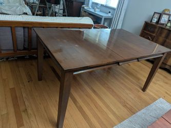 5x3 foot  dark brown wood stained dining or kitchen table