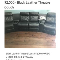 Black leather theater couch