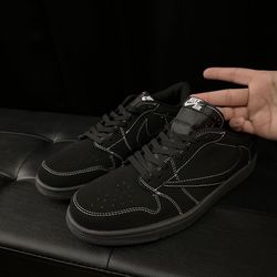 Men’s black Jordan 1 low