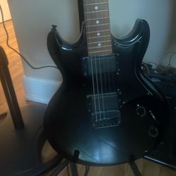 Electric Guitar With Amplifier 