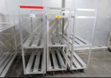 Commercial Aluminum freezer/cooler shelves and Carts shelving without wheels start at $50 with 2 sheves and the ones with wheels start at $150-$200 ea