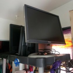 Set of four flat screen monitors