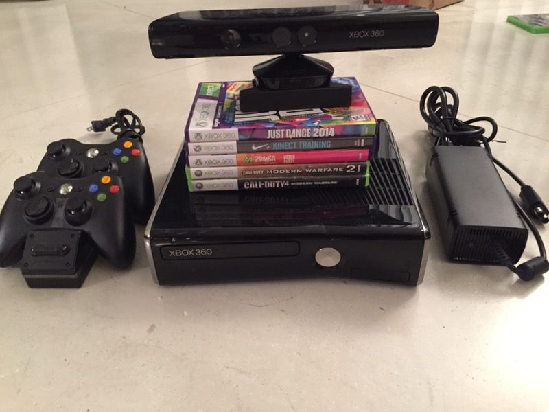 XBOX 360 w/ Kinect, 2 controllers and games