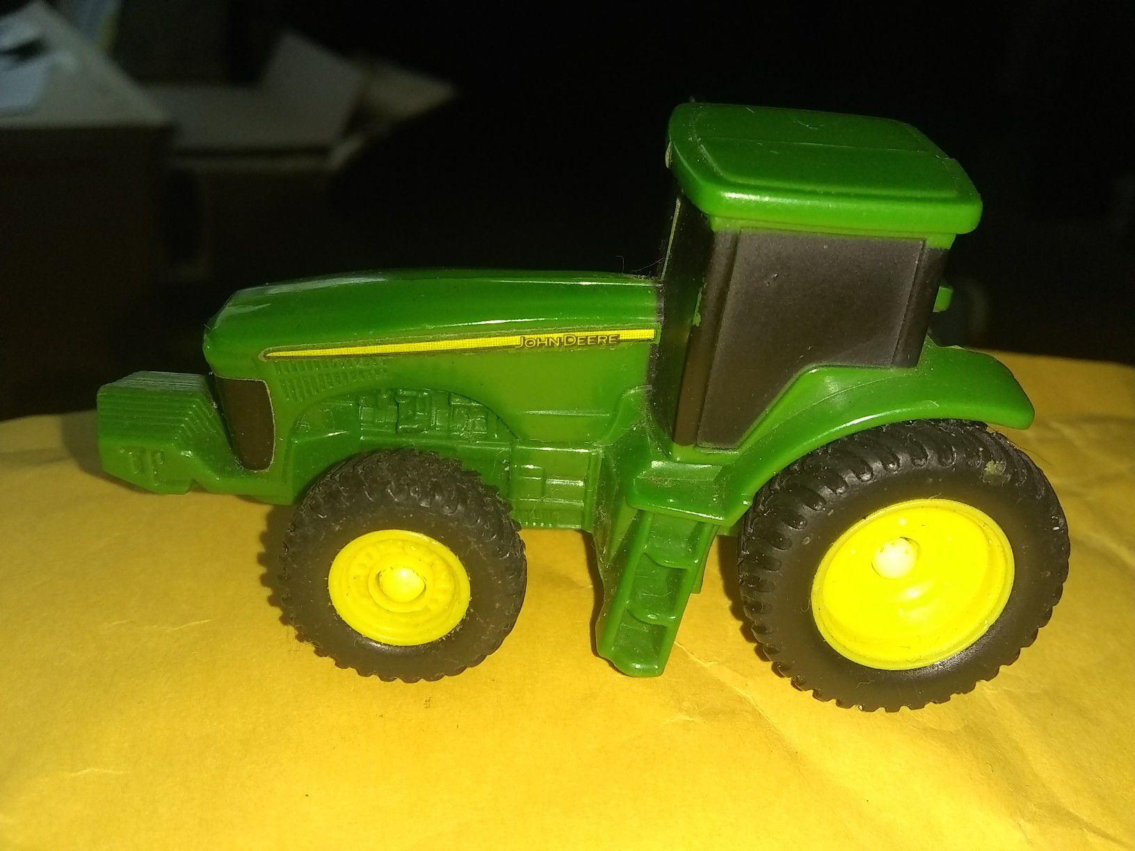 Little mini version of John Deere tractor