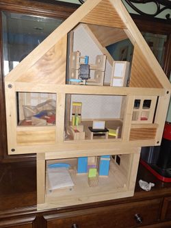 Plan toys  2 story dolhouse and  play furniture
