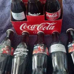 9 Vintage Coca-Cola Collector Bottles 