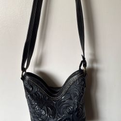 Black embossed leather crossbody bag by B.O.C. Born Concepts