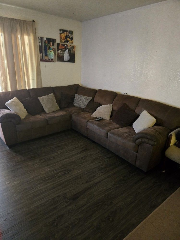 Brown sectional couch