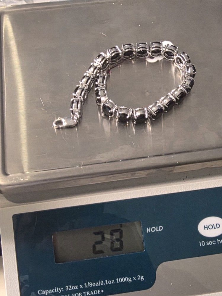 Sterling Silver 925 Rings, Bracelets, Earrings And Moore.