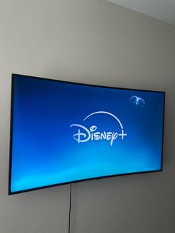 Curved Flat Screen Smart TV