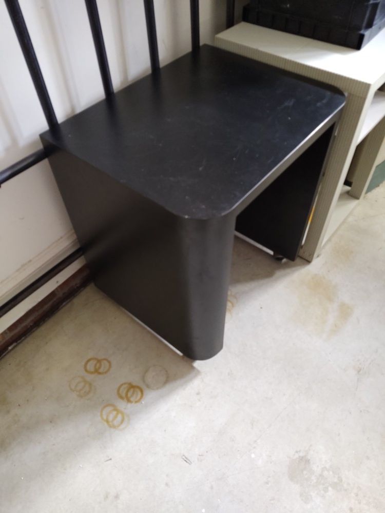 Black Formica rolling table