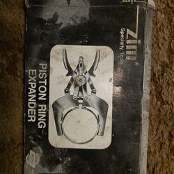 Piston ring expander