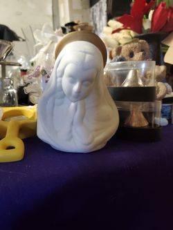 White virgin mary candle holder