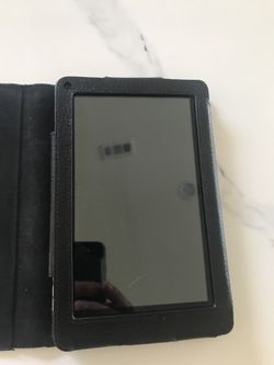 Kindle Fire (1st Gen) with leather case -like new