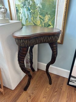 Vintage clover shape wooden side table leather top carved wood horn shaped legs 17” W x 28” H