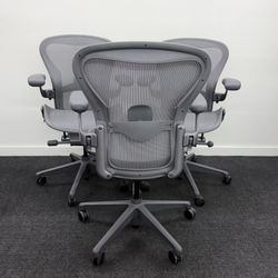 HERMAN MILLER REMASTERED AERON SIZE B CHAIRS CARBON MESH & FRAME FULLY ADJUSTABLE ARMS,ADJUSTABLE LUMBAR $800 EACH DELIVERY AVAILABLE 