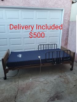 Invacare full electric hospital bed