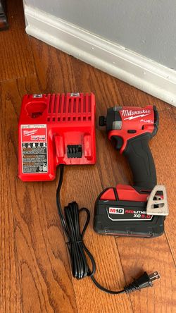 Milwaukee M18 impact driver 5.0 battery and charger