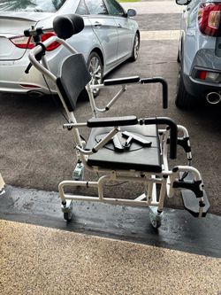 Reclining rolling shower chair