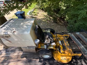 Walker lawnmower with 20 hp Kolher and GHS Grass handling system