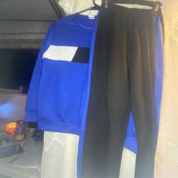 Almost New, 2 piece, size 10..blue and black sweatsuit outfit